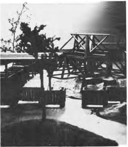 Original photograph of the proposed Tot Lot model, showing play structures, platforms and miniature landscaping.