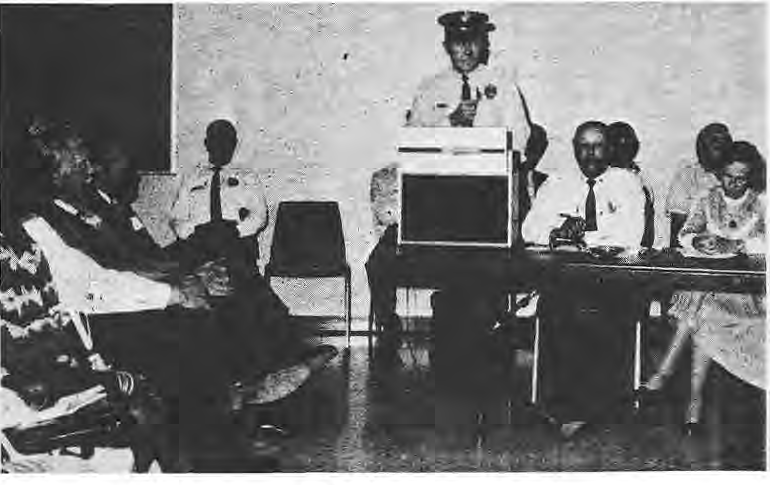 Participants at a historical neighborhood gathering, reproduced from June 1977.