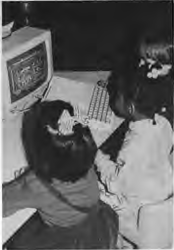 Children using the Computertot program at St. Roch Preschool. Photographer not credited.