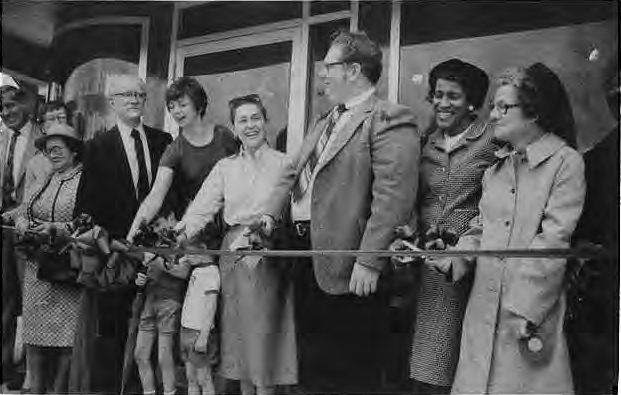 Neighbors gather to open the library kiosk in1983. Photo by King Schoenfeld.
