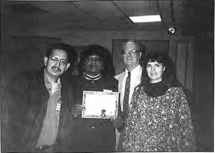 Accepting the Mayor’s Community Service Awards at the Cedars Hall on January29,1997,were,from left,Roy Roncal,Shirley Polk,Art Santen,and Linda Cross. Photographer not credited.
