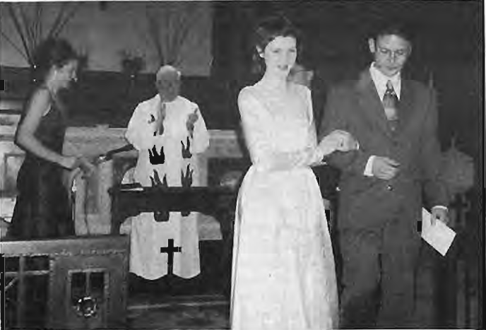 Roell Ann Schmidt and Matthew Hickey at All Saints Catholic Church,February28,1998. Photographer not credited.