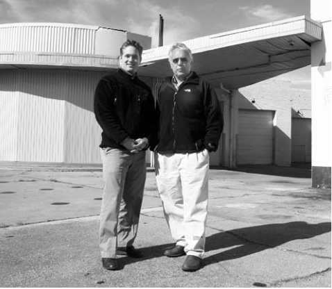 Josh and Neal Shapiro in front of the old Yellow Cab Co., soon to be removed for a new retail and office development.
