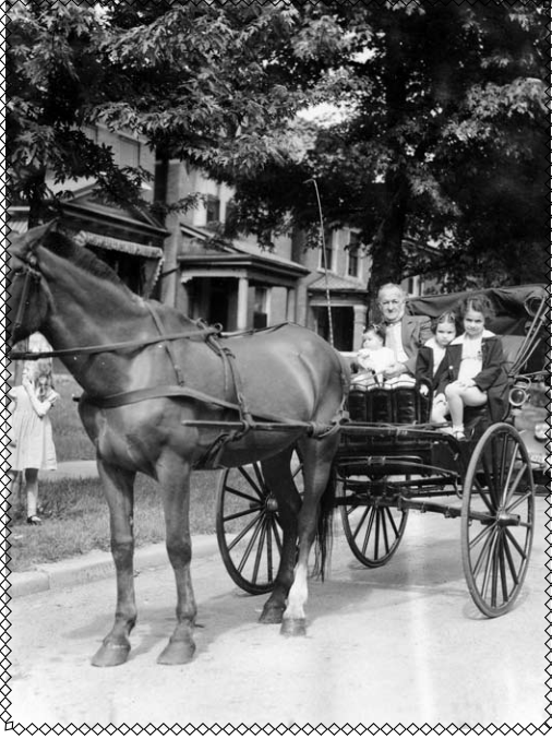 Since I am the babe in my grandfather’s [David H. Wolfort] arms in this photo I can date it at spring, 1939. His buggy is parked in front of your house [6145 Mc Pherson] but you can clearly see 6135 with the awning and 6131 with the white pillars. (from Mrs. Dale Harrell)