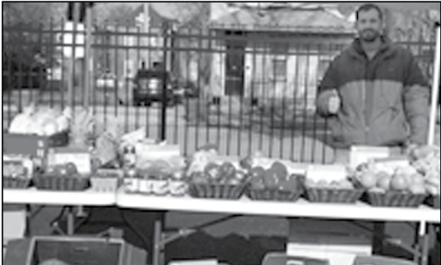 Farm to Family Naturally mobile market. Descriptive caption supplied.