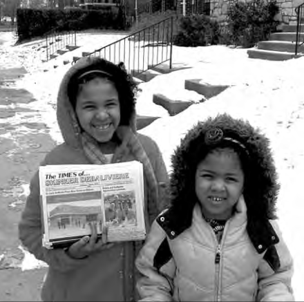 Nyla and Cienna Johnson, newest TIMES deliverers, daughters of Cardina and Nate Johnson.
