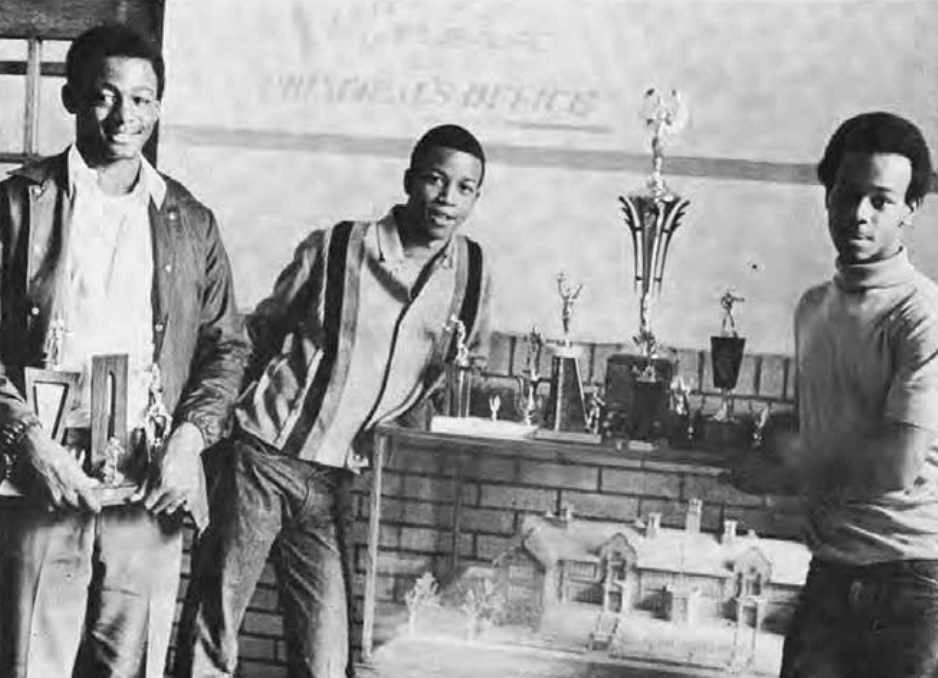 Hamilton School champion boxers Marshall Franklin, Clifford Westbrook and Steven Westbrook. Caption labels May nineteen seventy, while essay says June; original disagreement preserved.