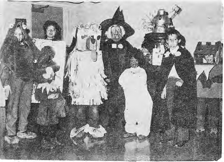 Original Halloween costume photograph; individual positions not inferred.
