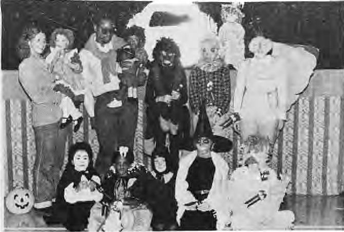 Original photograph of costumed children at the neighborhood Halloween party.