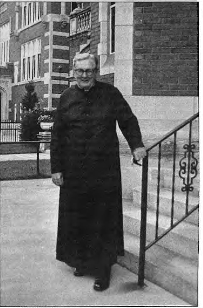 Monsignor Robert Peet outside St. Roch’s.