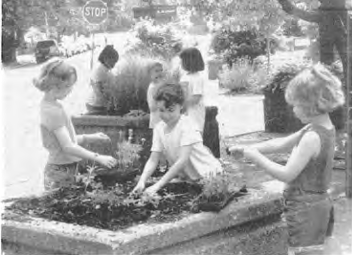 Brownies helping beautify the neighborhood, accompanying Playground Gets Green. Photographer not credited.