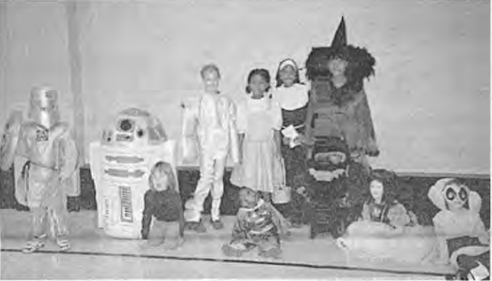 Costume contest at St. Roch’s Halloween Party. Full source names retained in article. Photographer not credited.