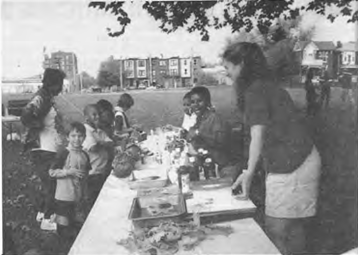 Pumpkin decorators at Lucier Park Fall Festival, October 21, 2001. Photographer not credited.