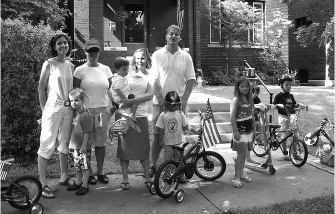Neighbors at Fourth of July parade. Photographer not separately printed.