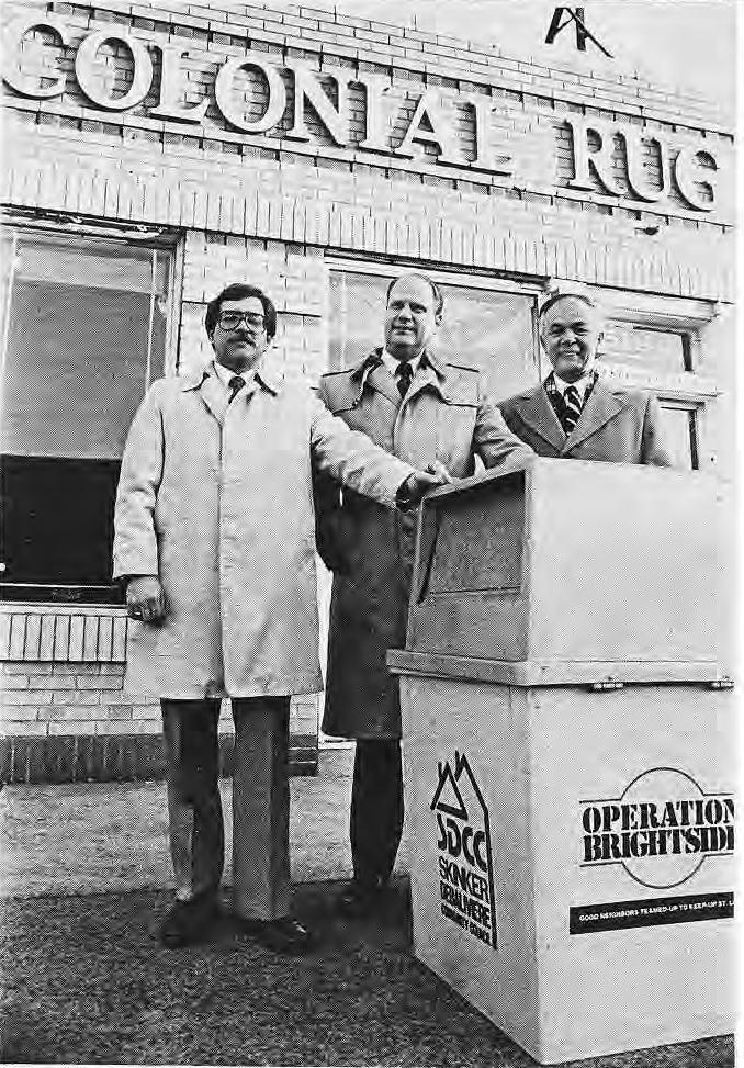 Mike McCormack, Sandy Rothschild and Bill Shiller with Brightside containers.