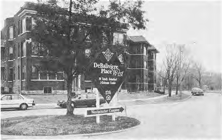 DeBaliviere Place West sign and renovated buildings.