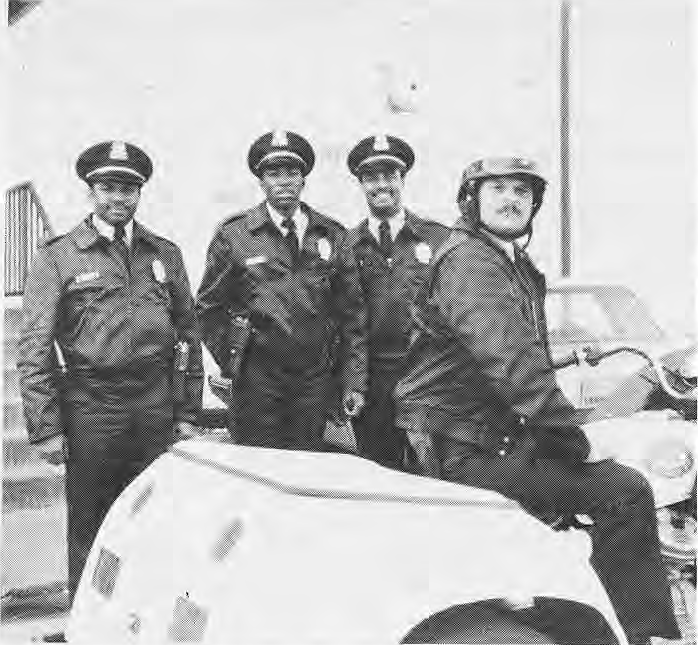 The officers of the St. Louis Police Department 7th District including (from left): Officer Jerald Barnes: A resident of 53xx Pershing, he joined the Department in 1988. Officer Cornelius McFerren: Recently graduated from the police academy, his first assignment is in the 7th district. Officer Bobby Baker: A police officer for 13 years, the last 2 in the 7th District. Officer Mark Karpinski: 16 years on the police force, he walks a beat along Pershing and DeBaliviere.