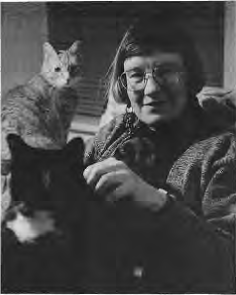 New Times editor Lana Stein with her cat. Photographer not credited.
