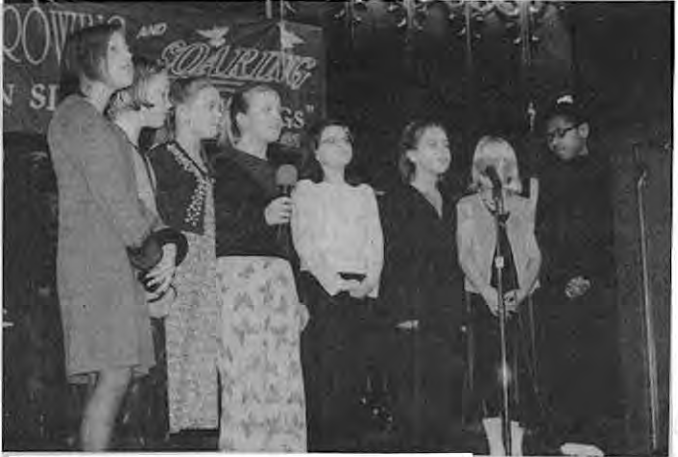 Children perform at King commemoration; not individually identified in source. Photo by King Schoenfeld.