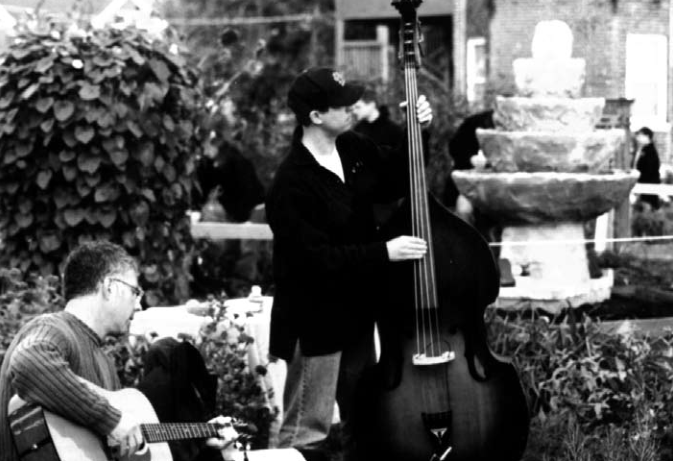 David Melson and Marc Chechik contribute upright bass and acoustic guitar music. Photo by Andy Cross.