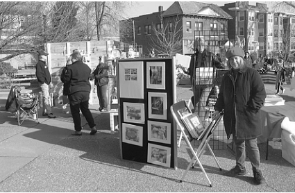 Visitors enjoy outdoor Wintermarkt. Photo by King Schoenfeld.