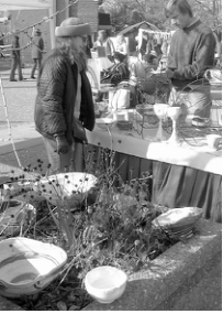 Wintermarkt vendor offers plants and crafts. Photo by King Schoenfeld.