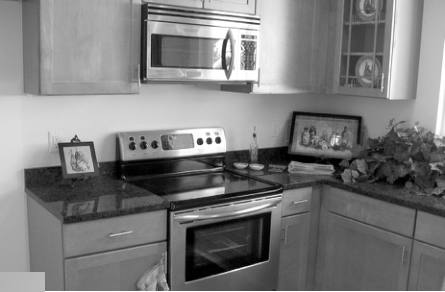 Kitchen in Mc Pherson Place home. Photographer not credited.