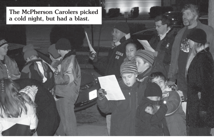 The Mc Pherson Carolers picked a cold night, but had a blast. Photographer not credited.