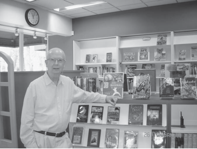 Charles Lampkin at Charing Cross Library. Descriptive caption supplied; photographer not credited.