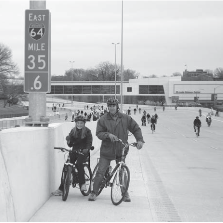 Andy and Sarah Jane Cross help reopen I-64 in December. Photographer not credited.