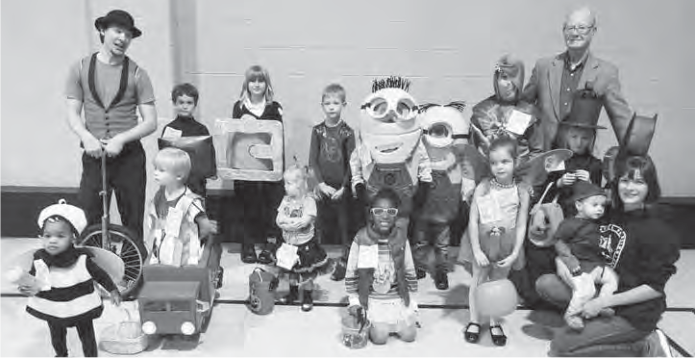 Halloween costume winners. Printed roster retained in article.