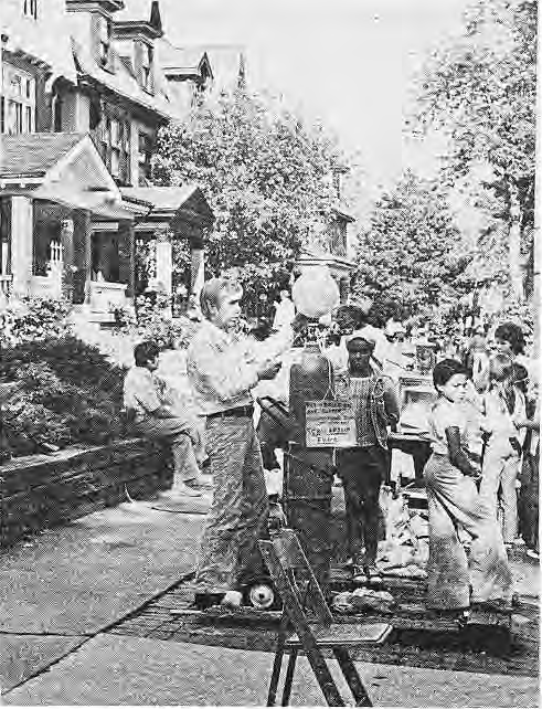 Original photograph from the June 1976 Art Fair photographic spread. Visitors gather along Kingsbury.