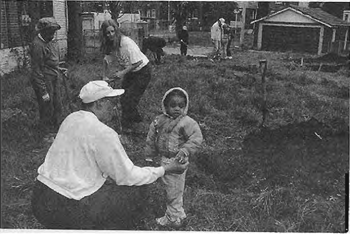 Neighbors establishing Block Unit1035Community Garden. Photographer not credited.