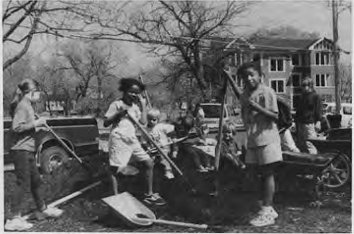 Neighborhood youth hard at work. Photo by Andy Cross.