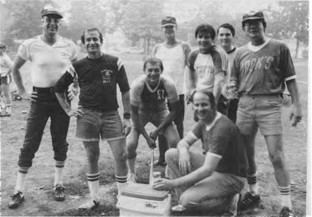 Battling Beagles softball team, originally published September 1984. Source tentatively identifies Marv Nodiff, Roy Bell, Jerry Lorenz and Paul Kurtz; no unverified player positions assigned. Photographer not credited.