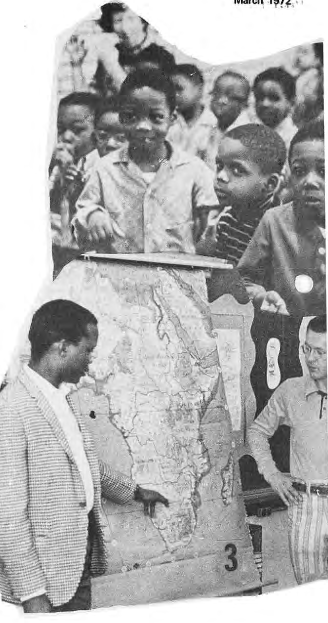 Original Hamilton classroom photographs, including Israel Montegne pointing to southern Africa on a map.