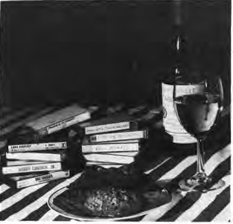 Roy Roncal photographed his choice of a favorite menu—a plate of cookies, a glass of wine, and music.