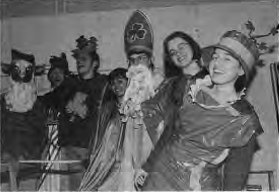 YAHOO 1992–93 young artists with Bill Christman and St. Patrick costumes for the 1993 Mardi Gras float “Woops, wrong parade.” Left to right: Billy Chavez (Sheep’s Head), John McGuire, Sam DiLorenzo, Patricia Chavez, Jeremy Schoenfeld, Carla Beyer and Lucy Griesbach. Photographer not credited.