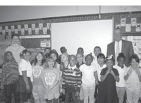 Senator Joe Keaveny visiting Mason School. Descriptive caption supplied.