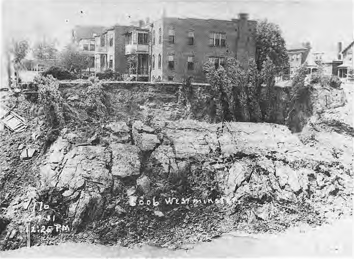Historic view of an open River Des Peres channel and Westminster houses.