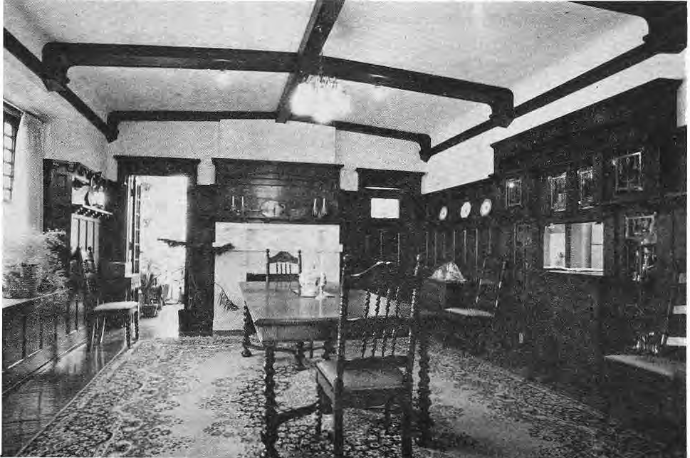 Original photograph of the Watkins dining room with oak paneling and beamed ceiling.