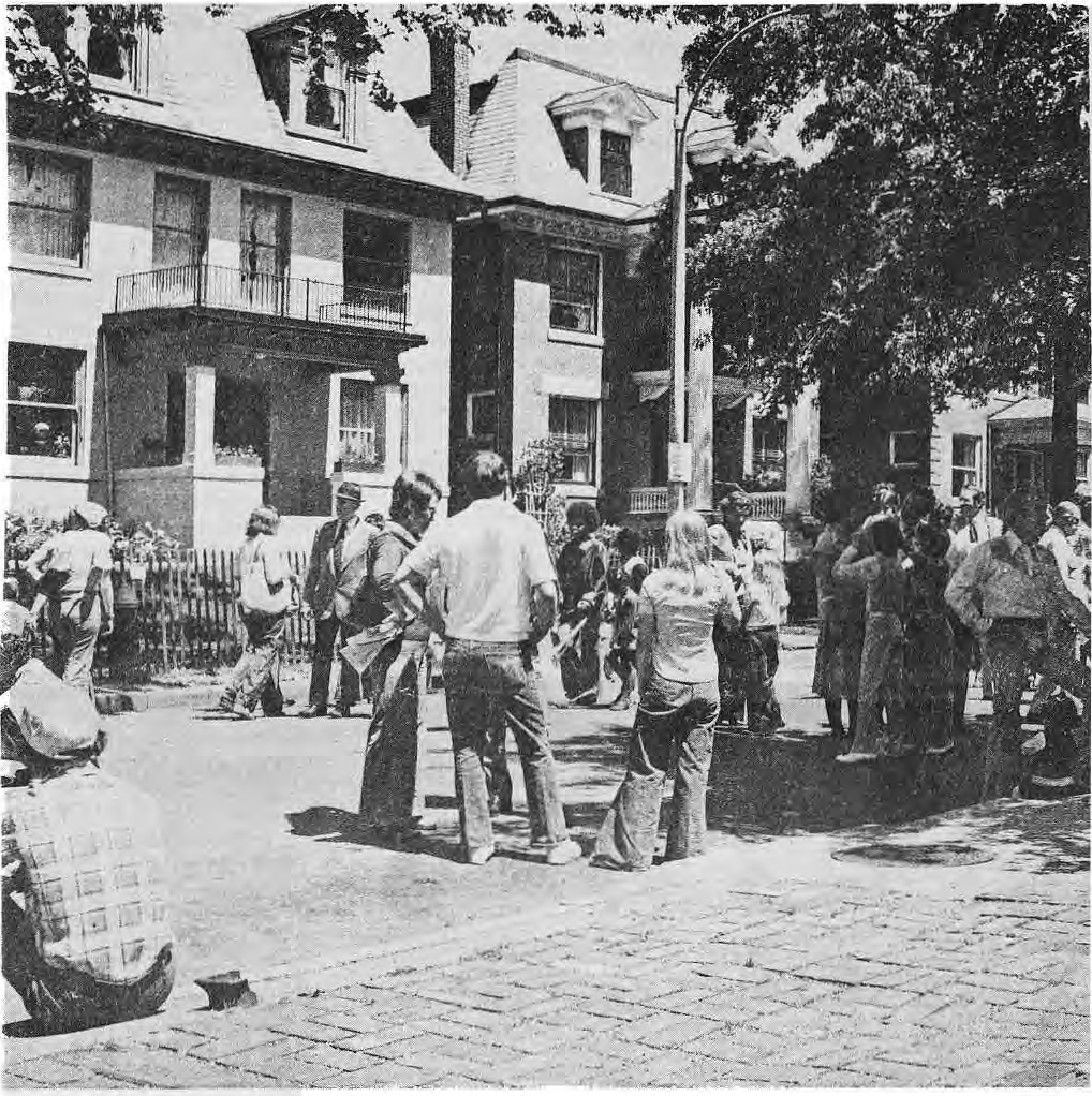 Original photograph of visitors at an Art Fair; no event year inferred from image alone.