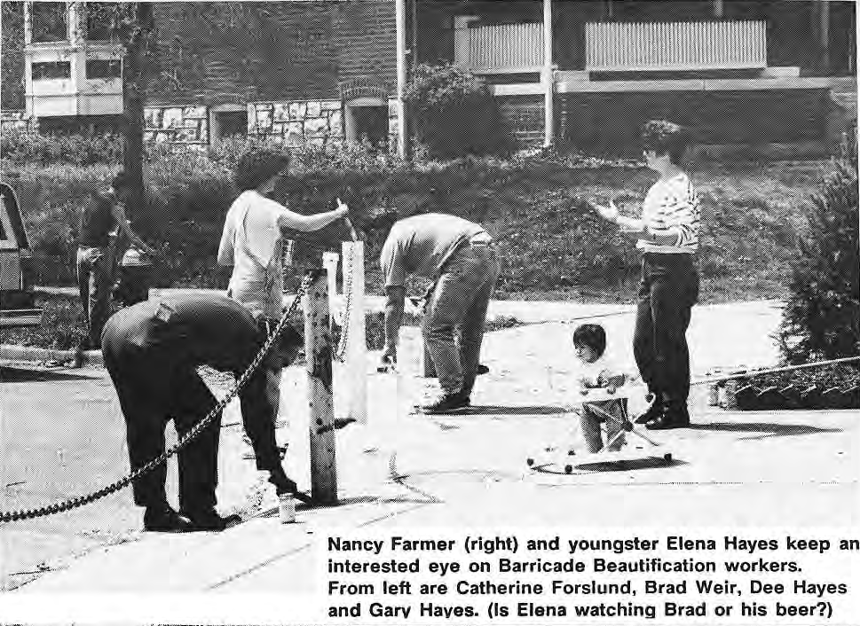 Nancy Farmer (right) and youngster Elena Hayes keep an interested eye on Barricade Beautification workers. From left are Catherine Forslund, Brad Weir, Dee Hayes and Gary Hayes. (Is Elena watching Brad or his beer?)