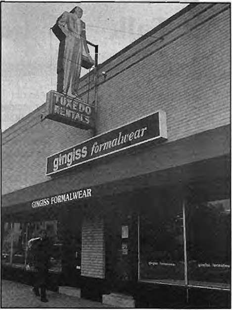 Projecting sign at Gingiss Formalwear.