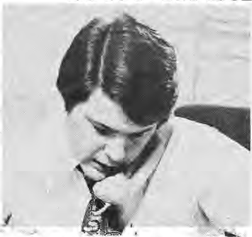 Original photograph of Vincent C. Schoemehl, Jr. writing at a desk.
