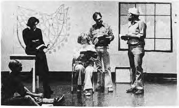 Cast members rehearse the neighborhood dinner-theatre production.