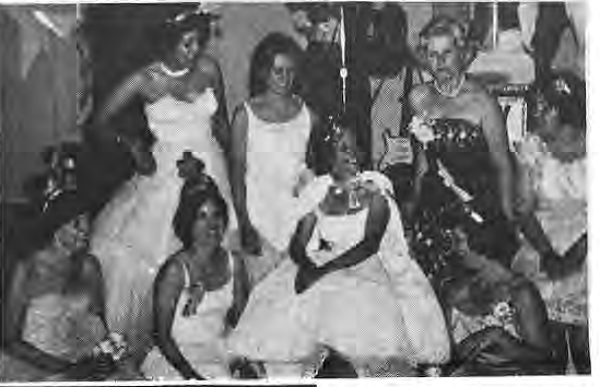 Costumed participants in the historical neighborhood prom photograph.
