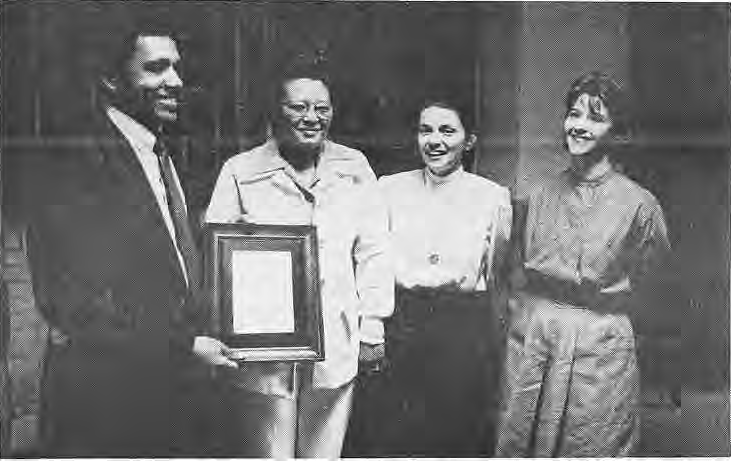 Jim McLeod, Esther Herron, Karleen Hoerr and Nancy Farmer with a recognition plaque.