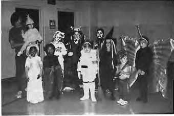 Children at the 31st neighborhood Halloween party. Photographer not credited.