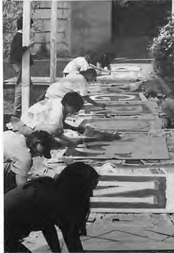 Students at Crossroads School create big playground blocks. Photographer not credited.